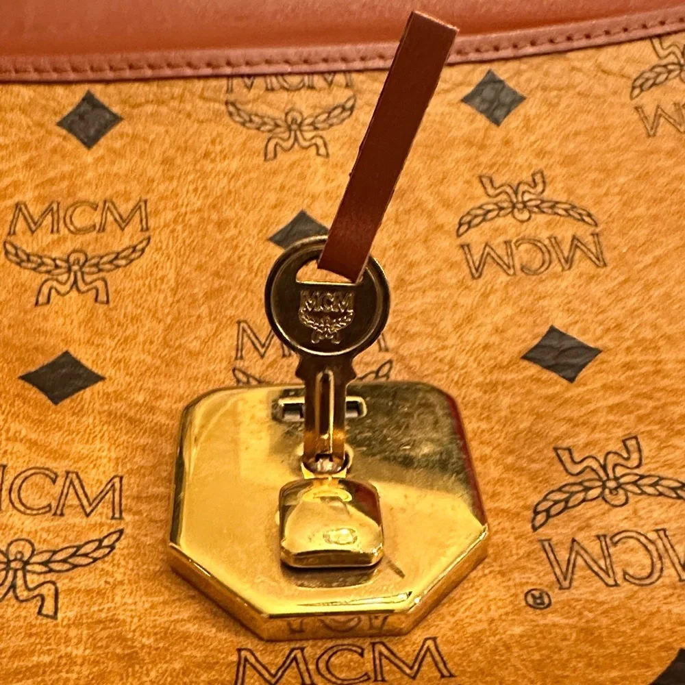 MCM Visetos Cognac Monogram Leather Clutch unisex Comes with original key! A+ - Picture 9 of 12